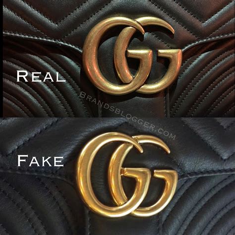 gucci pantcaon fake vs real|gucci handbags logo.